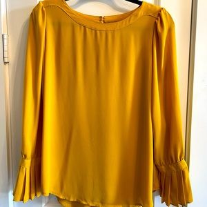 Gold/mustard color silk like top by Loft size M